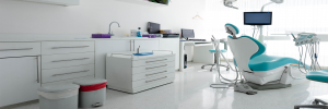 white-dental-office-and-blue-chair